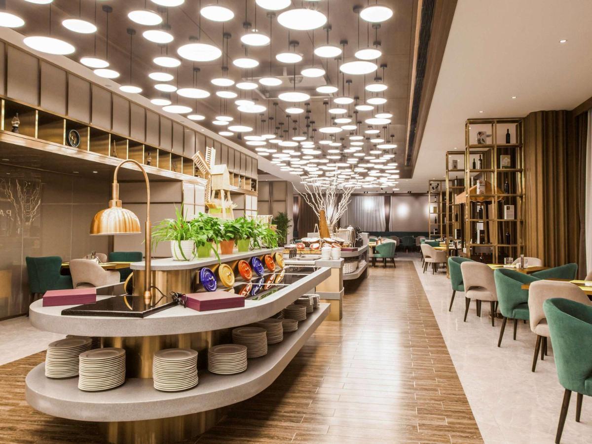 เมอร์เคียว ฮาร์บิน ซงเป่ย Hotel ภายนอก รูปภาพ