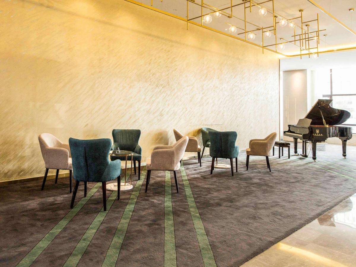 เมอร์เคียว ฮาร์บิน ซงเป่ย Hotel ภายนอก รูปภาพ