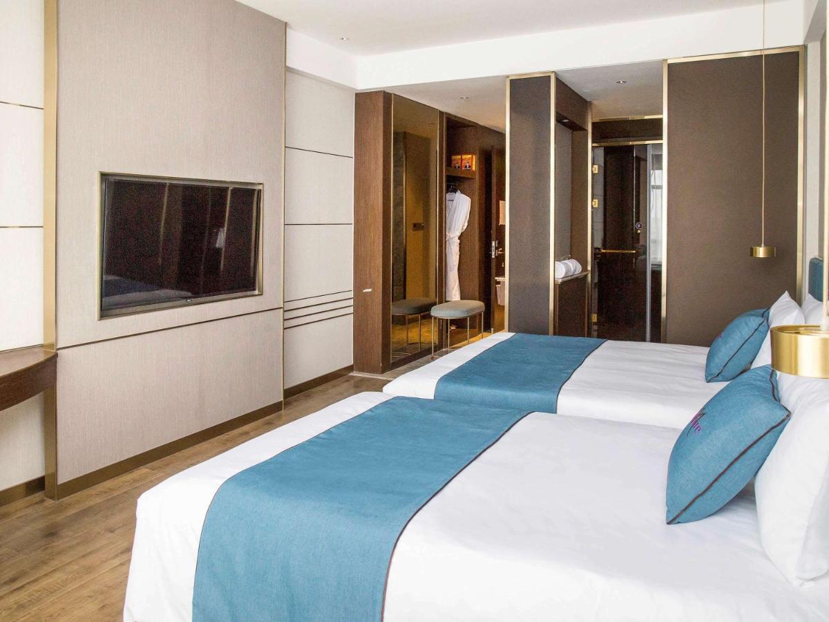 เมอร์เคียว ฮาร์บิน ซงเป่ย Hotel ภายนอก รูปภาพ